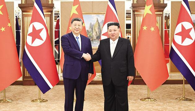 习近平同金正恩举行会谈